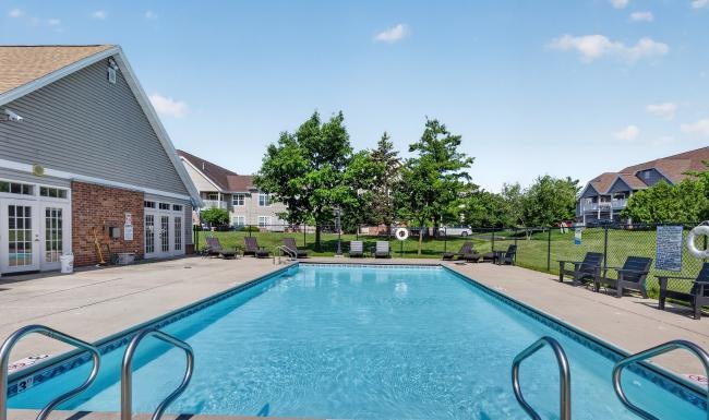 a swimming pool in a backyard